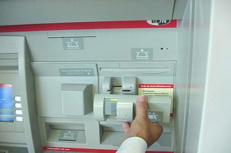 comment utiliser un guichet automatique