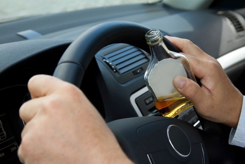 in a car with alcohol