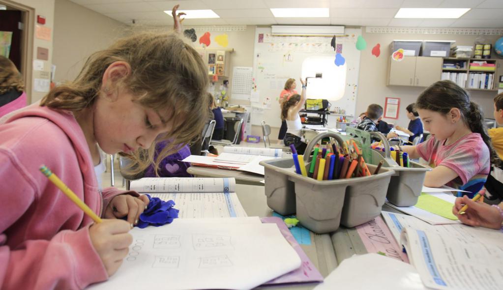 children perform an assignment