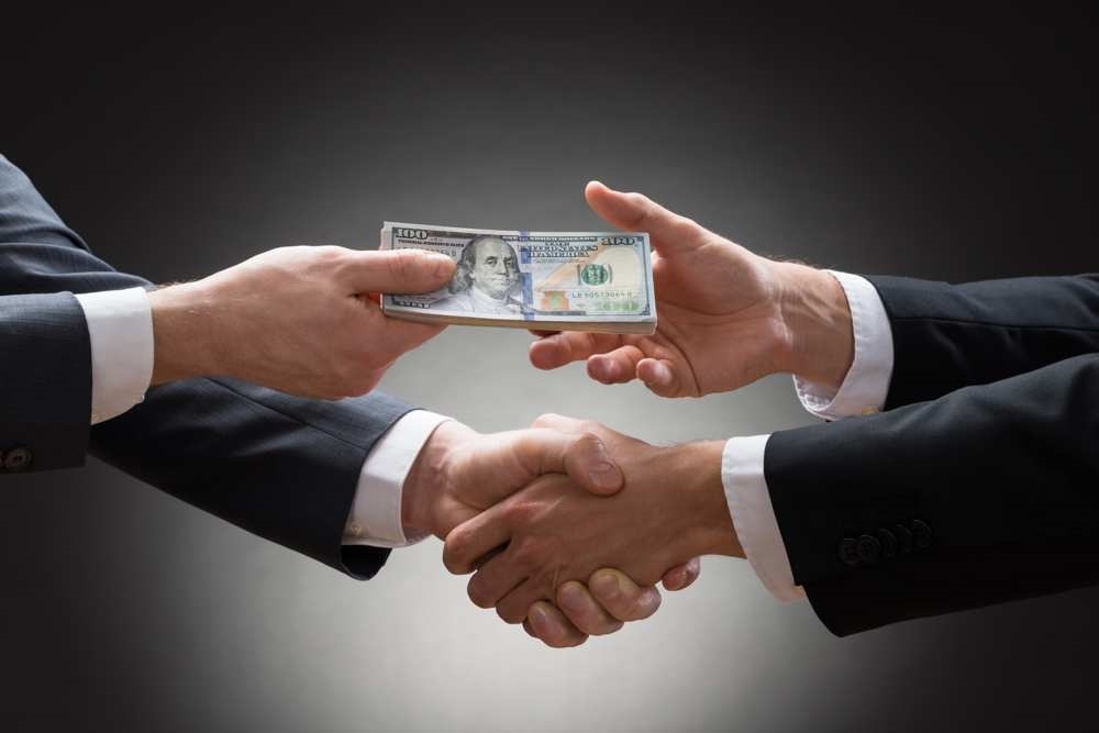 Corruption component in the actions of officials